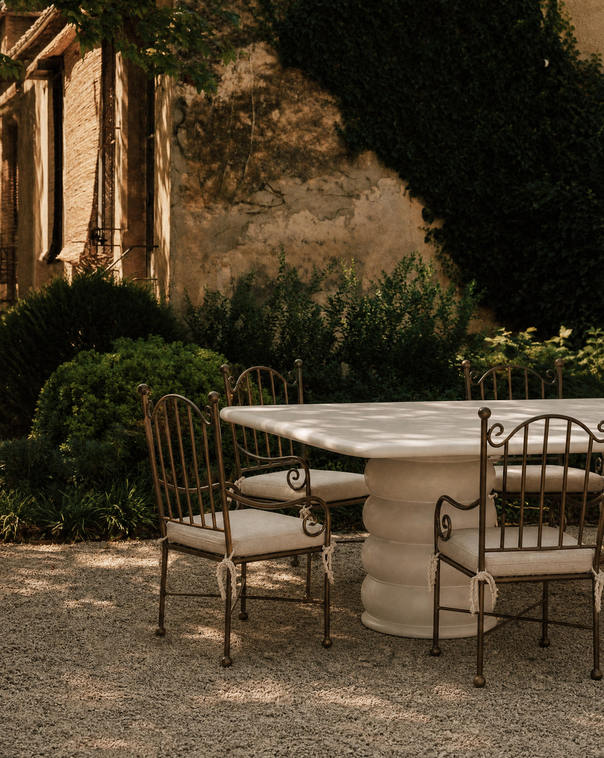 Aveline Chair, powder-coated iron with linen seat cushion, detail