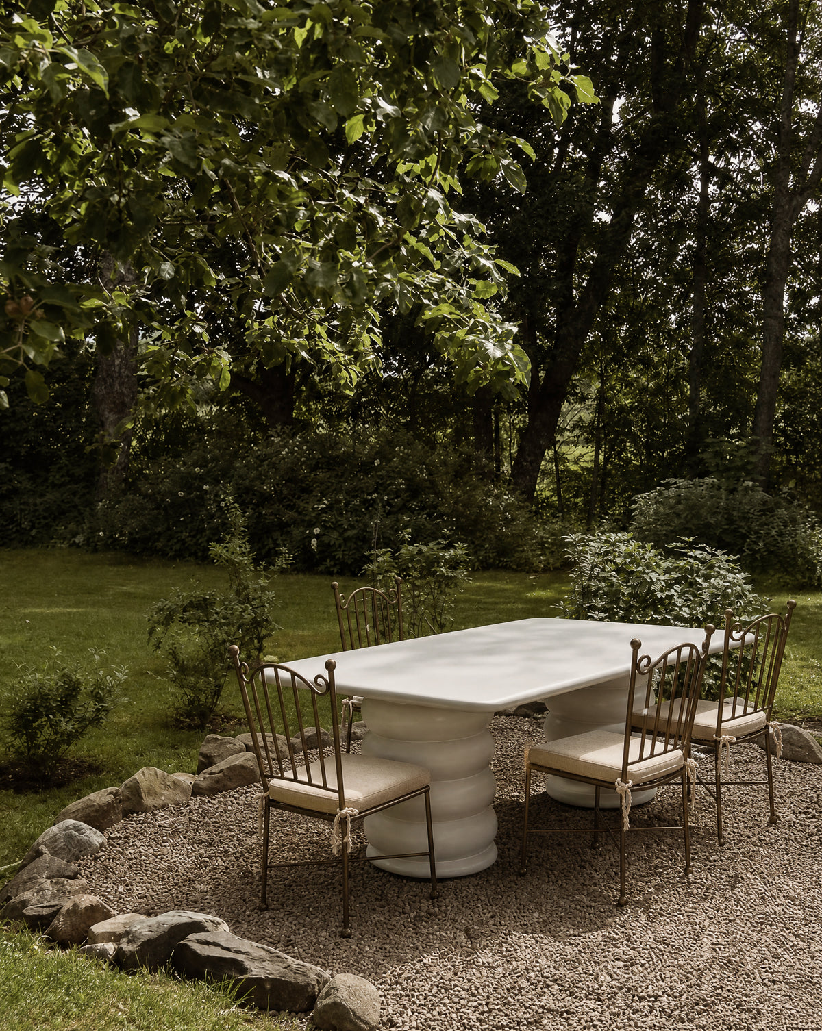 Aveline Chair, powder-coated iron with linen seat cushion, detail