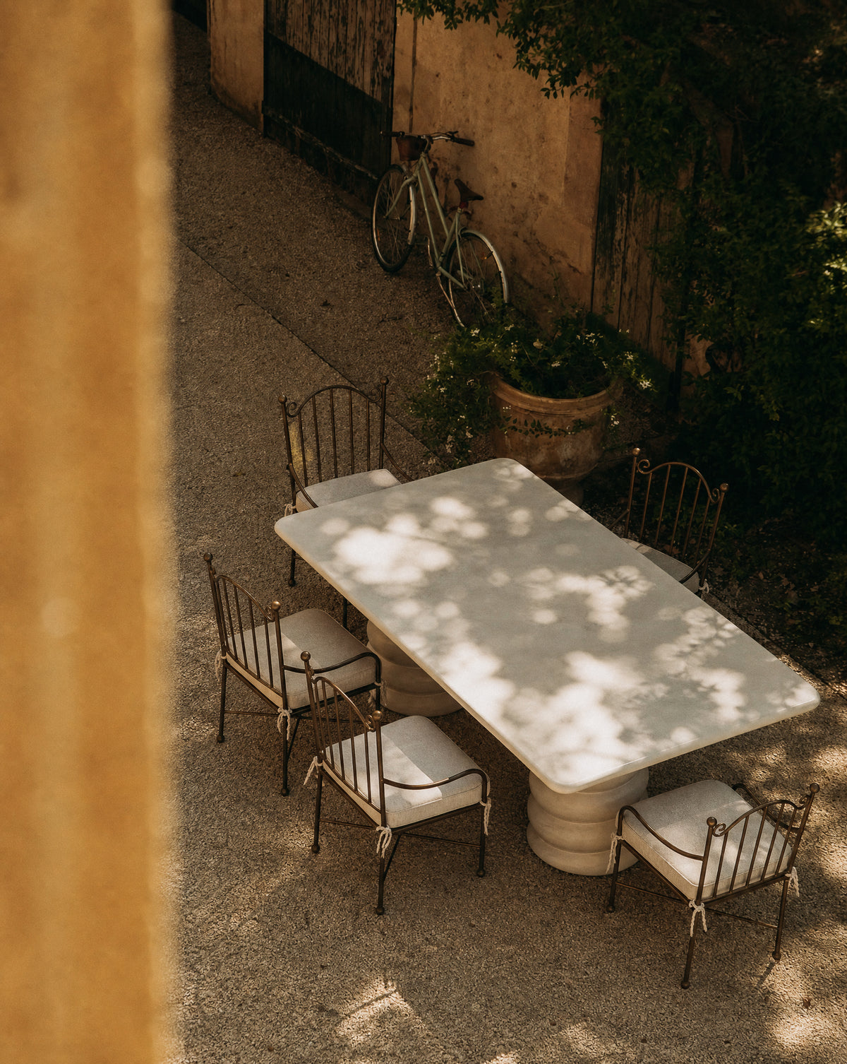 Aveline Chair, powder-coated iron with linen seat cushion, detail