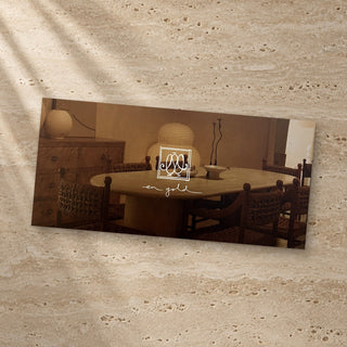 En Gold gift card on travertine stone