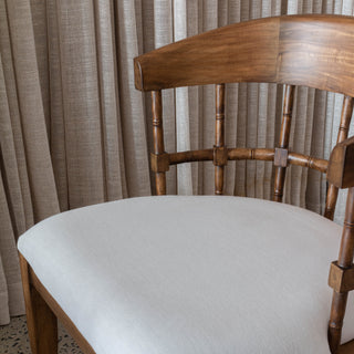 timber chair with white cushion